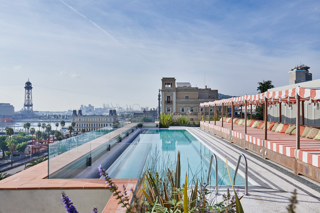 Rooftop pool with views across Port Vell