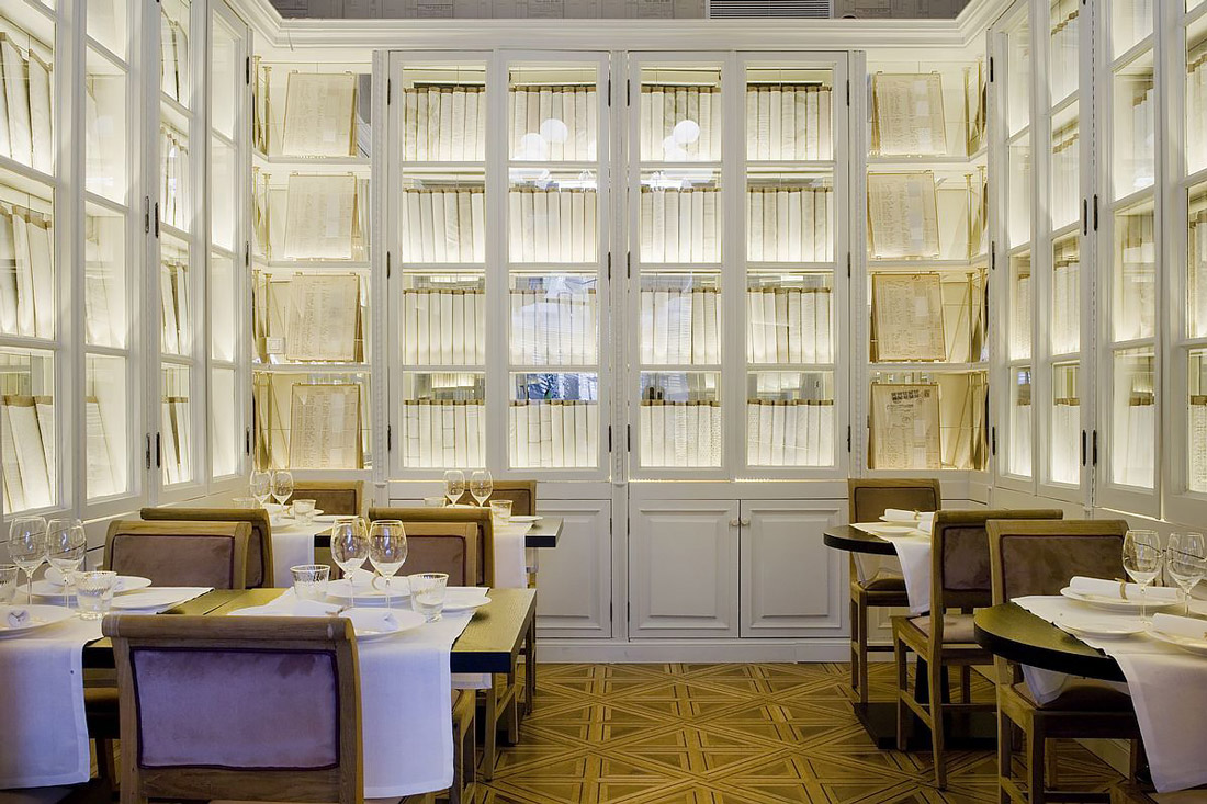 Dining room surrounded by antiques